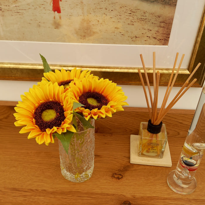 Yellow Sunflower Stems In Vase