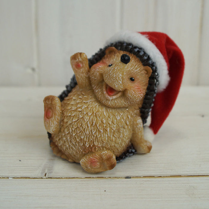 Waving Hedgehog Wearing A Santa Hat